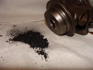Material from turbo oil passages. Volitile non-synthetic oils will do this.